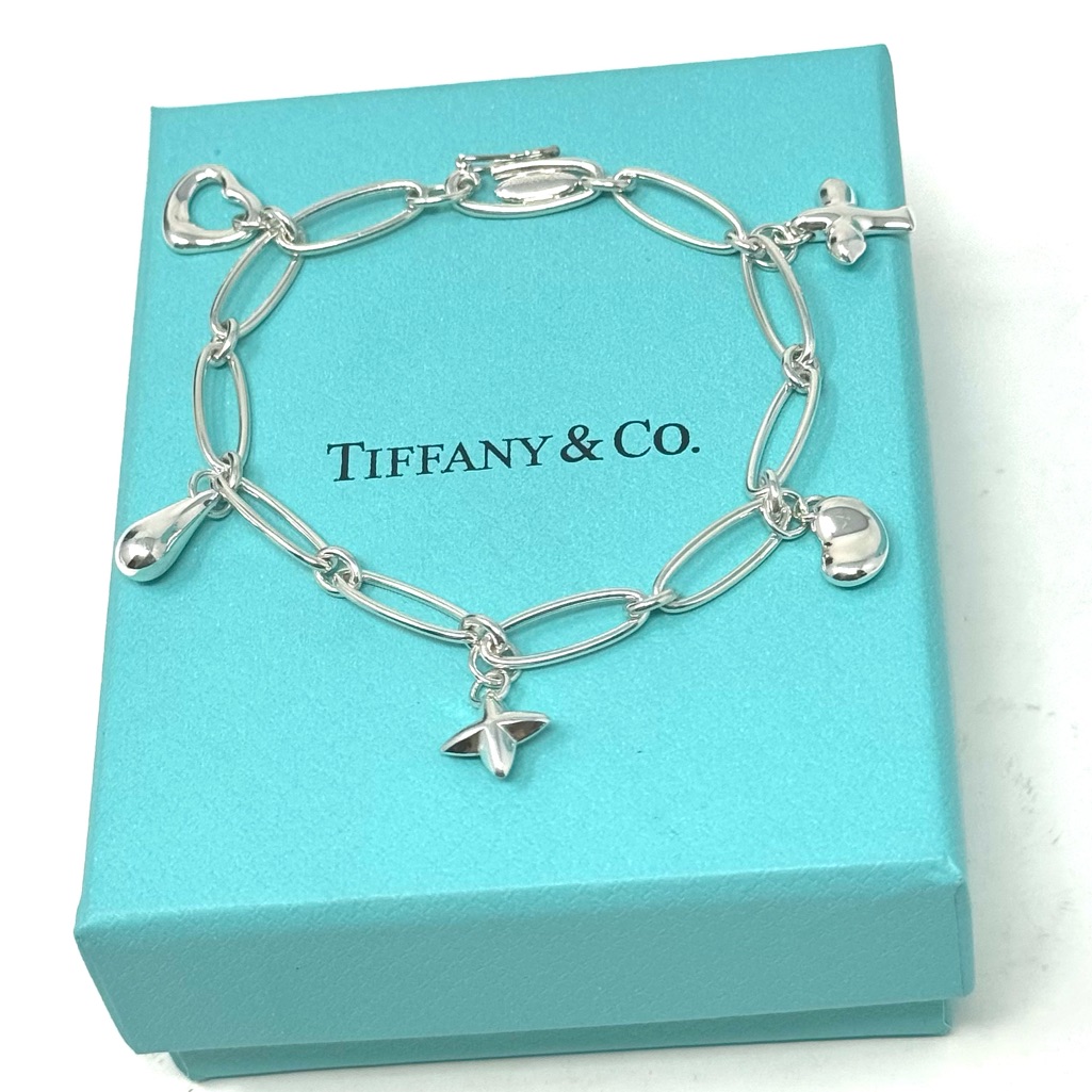 Authentic Tiffany & Co. Elsa Peretti Five Mini Charm Bracelet.